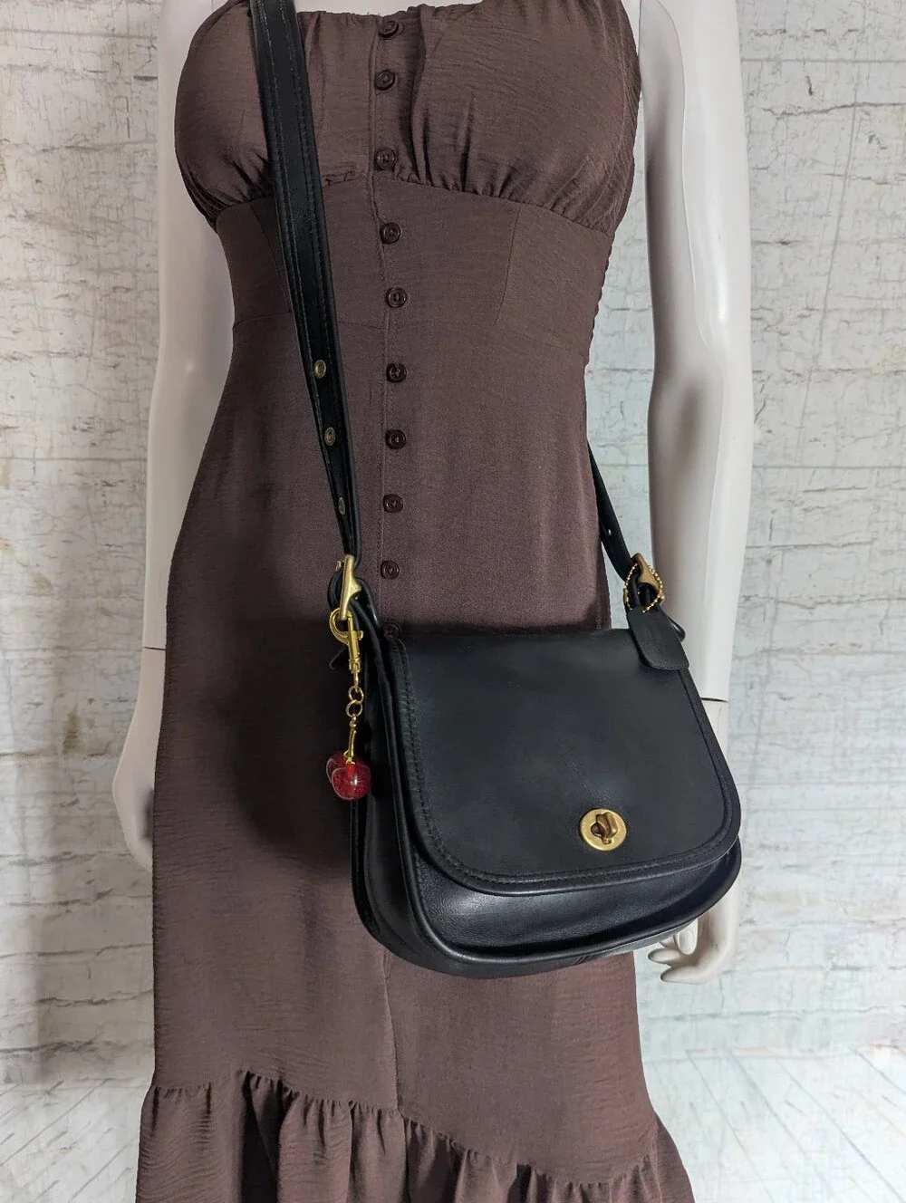 Coach Black Leather Crossbody with Gold Hardware and Cherry Charm